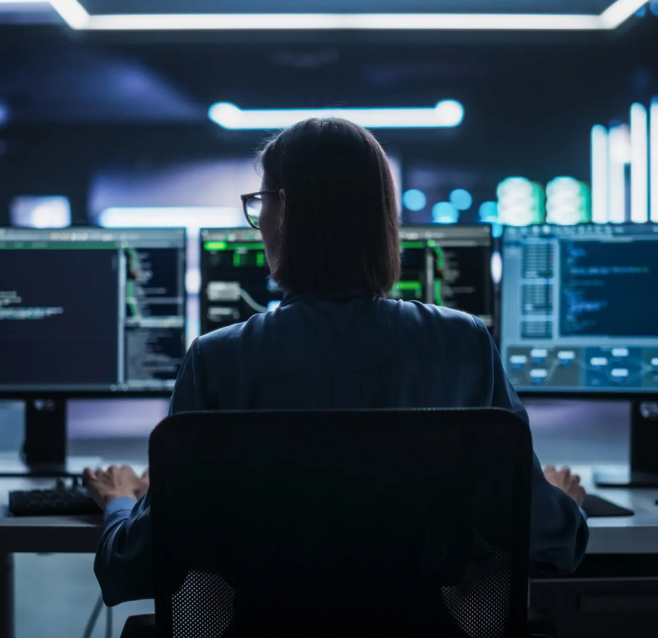 Programmer in a dark office